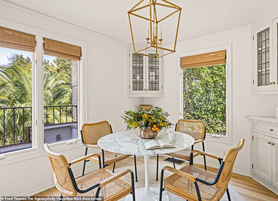 Sunny place: Spacious kitchen includes a generous breakfast nook with windows looking out to the ground